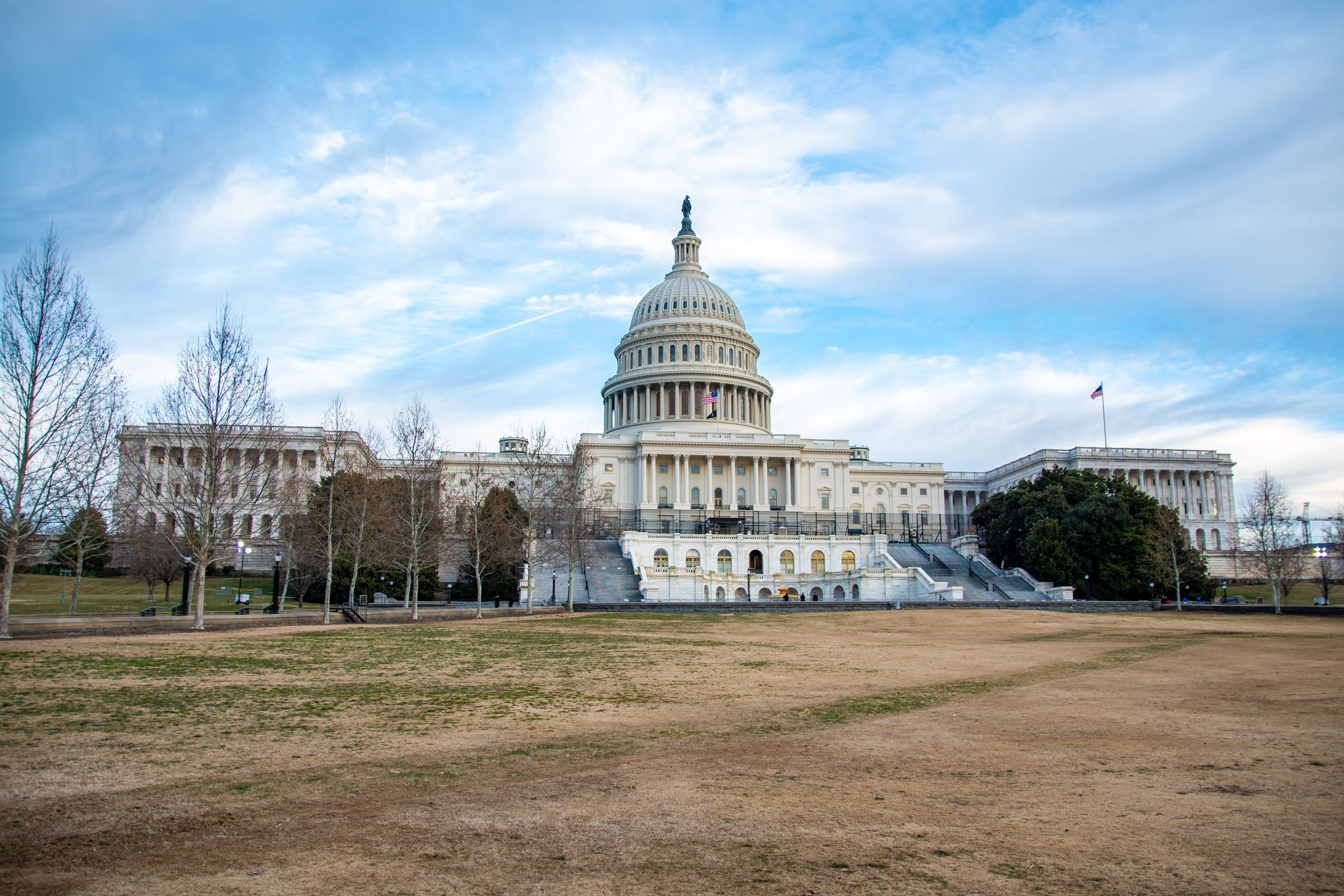 What Happens to Your Trip Insurance When a Destination Country Changes Government United States Capitol building under a clear sky, representing a destination country's government change