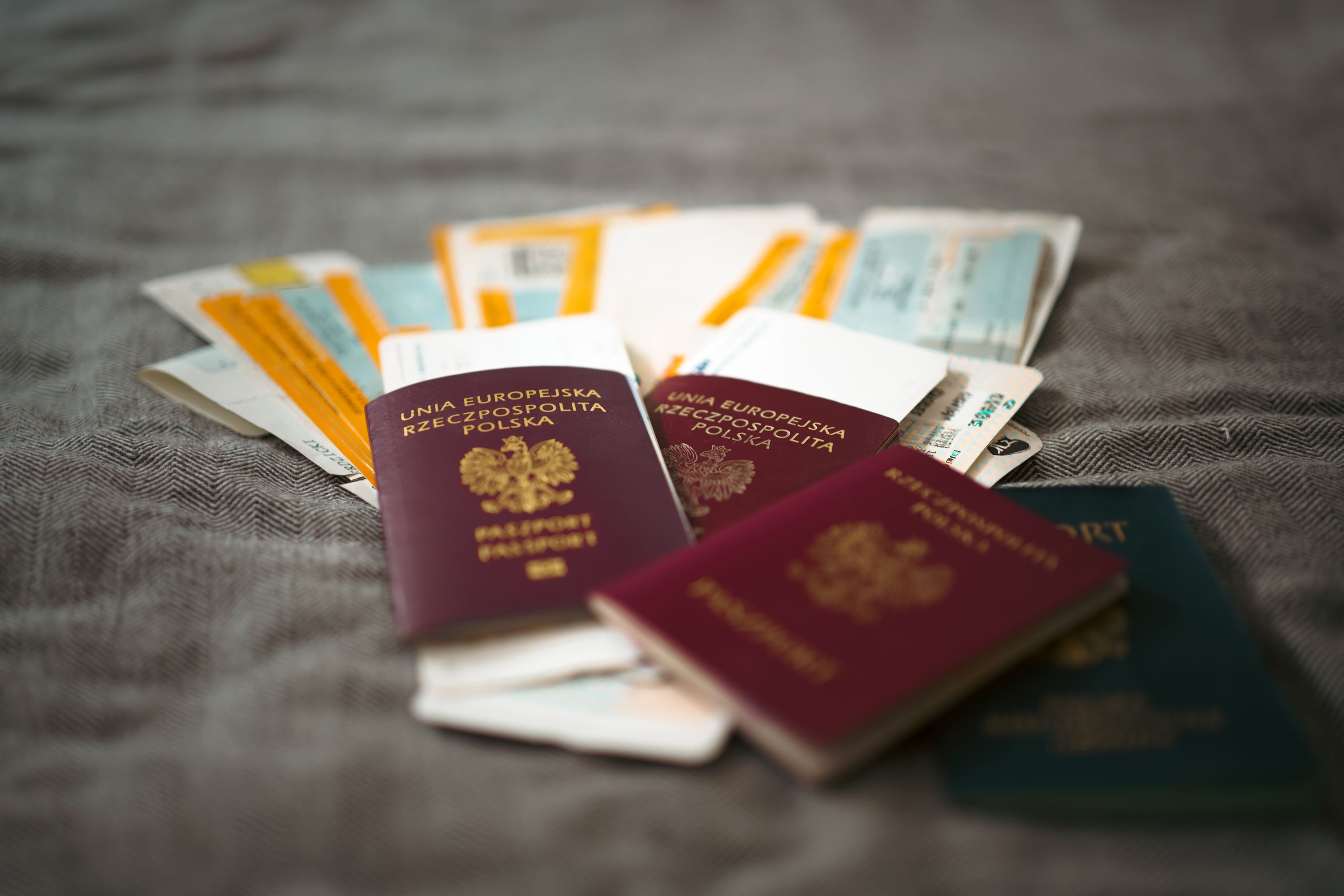 Close-up of passports and travel tickets symbolizing travel insurance documents